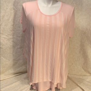 Cool Melon pink tee with fly away lace overlay.